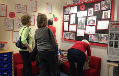 Members of Radcliffe U3A WWI team admire pupils' work